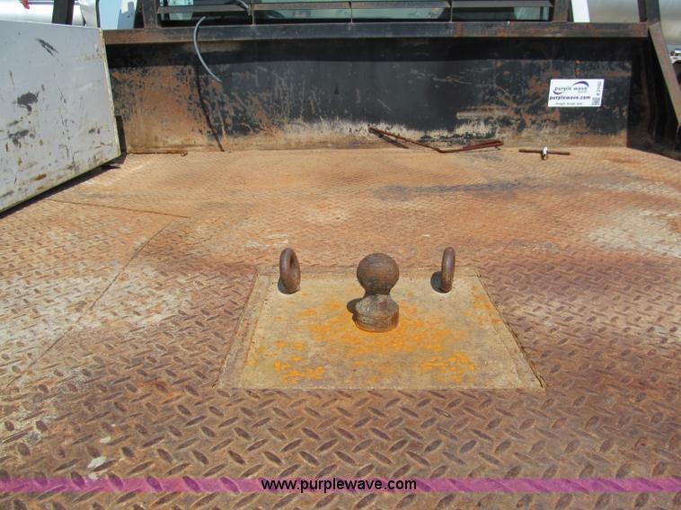 image for item E2102 1998 Dodge Ram 3500 Laramie SLT flatbed pickup truck