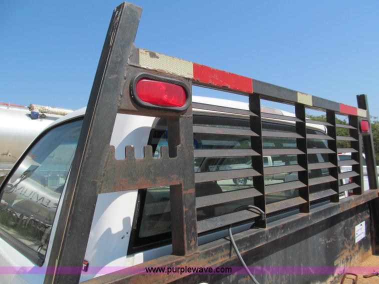 image for item E2102 1998 Dodge Ram 3500 Laramie SLT flatbed pickup truck