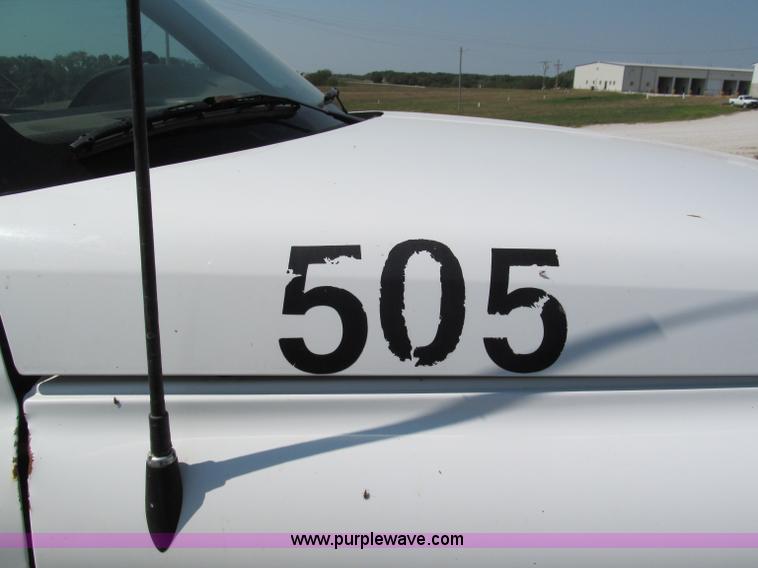 image for item E2102 1998 Dodge Ram 3500 Laramie SLT flatbed pickup truck