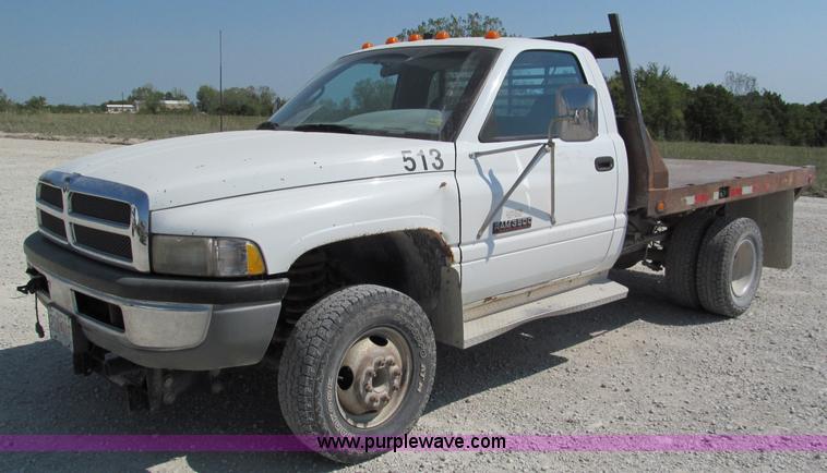 image for item E2105 1998 Dodge Ram 3500 flatbed pickup truck