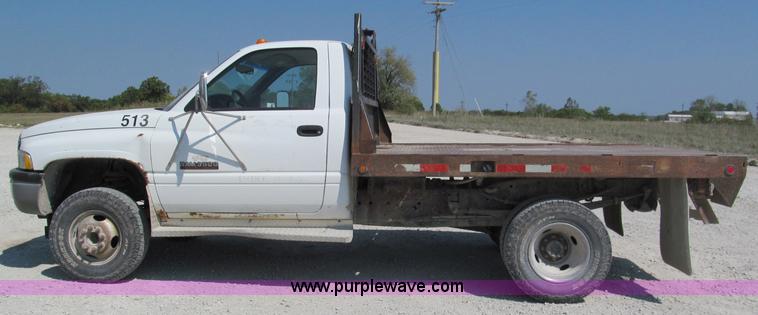 image for item E2105 1998 Dodge Ram 3500 flatbed pickup truck