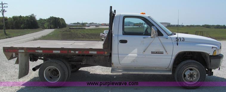 image for item E2105 1998 Dodge Ram 3500 flatbed pickup truck
