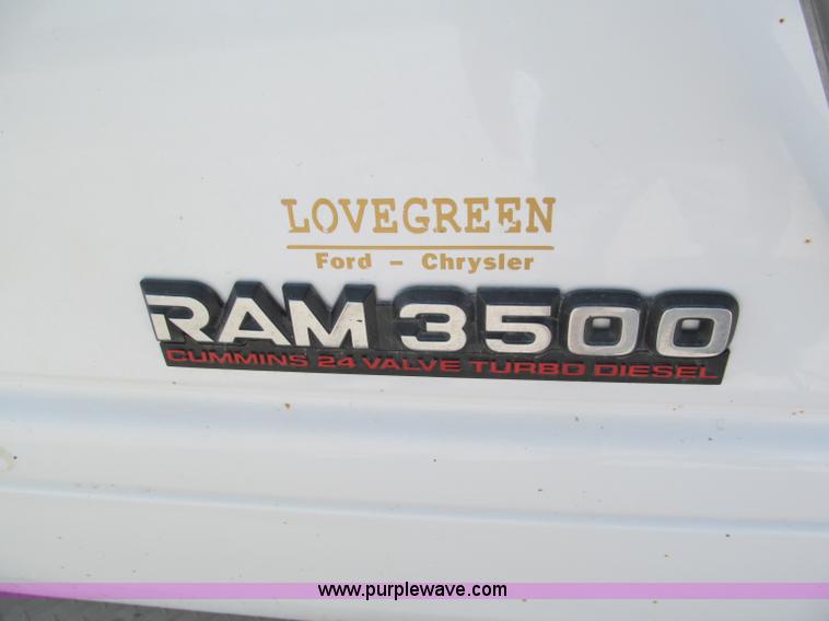 image for item E2105 1998 Dodge Ram 3500 flatbed pickup truck