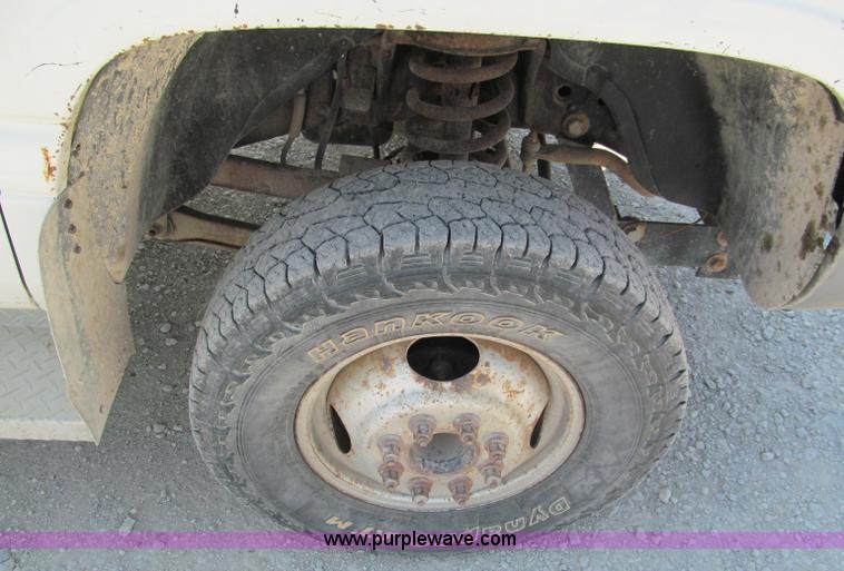 image for item E2105 1998 Dodge Ram 3500 flatbed pickup truck