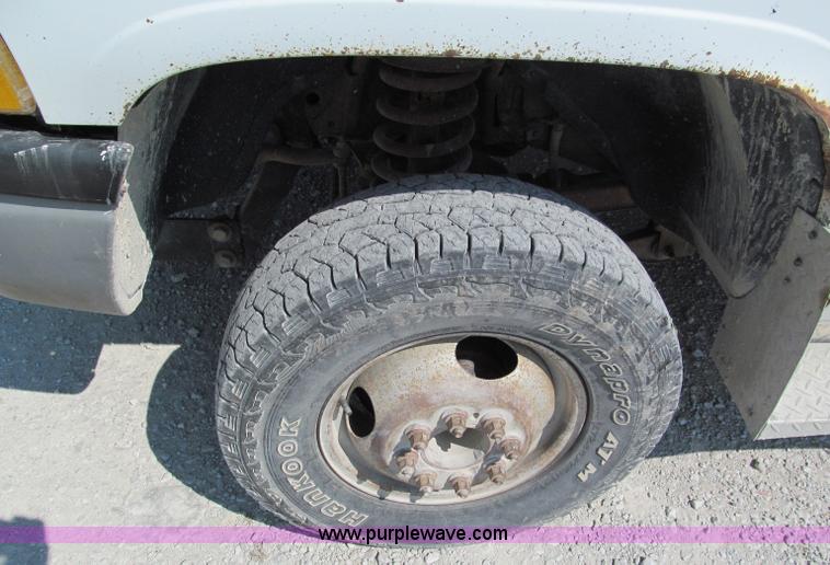 image for item E2105 1998 Dodge Ram 3500 flatbed pickup truck