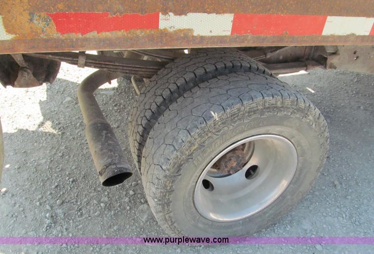 image for item E2105 1998 Dodge Ram 3500 flatbed pickup truck