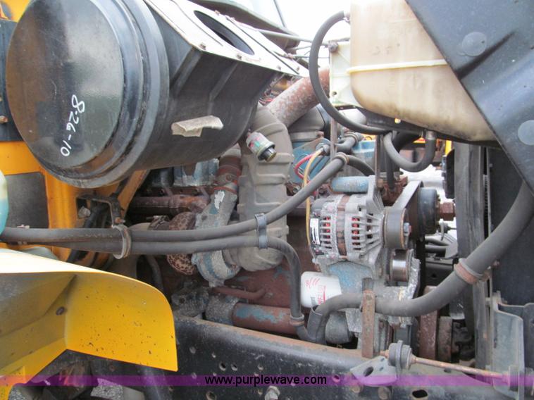 image for item E2153 1997 International 4900 flatbed truck