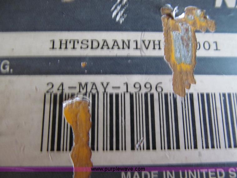 image for item E2153 1997 International 4900 flatbed truck