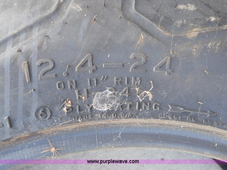 image for item E5506 Firestone 12.4-24 Field & Road Ag tire