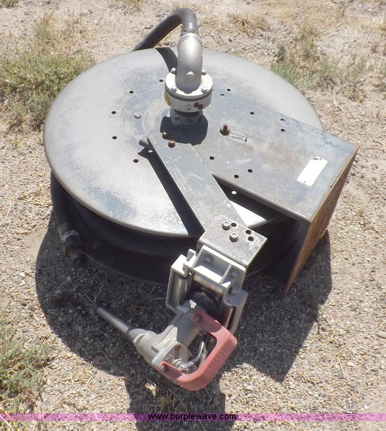 image for item F6020 Two fuel pumps and a hose reel