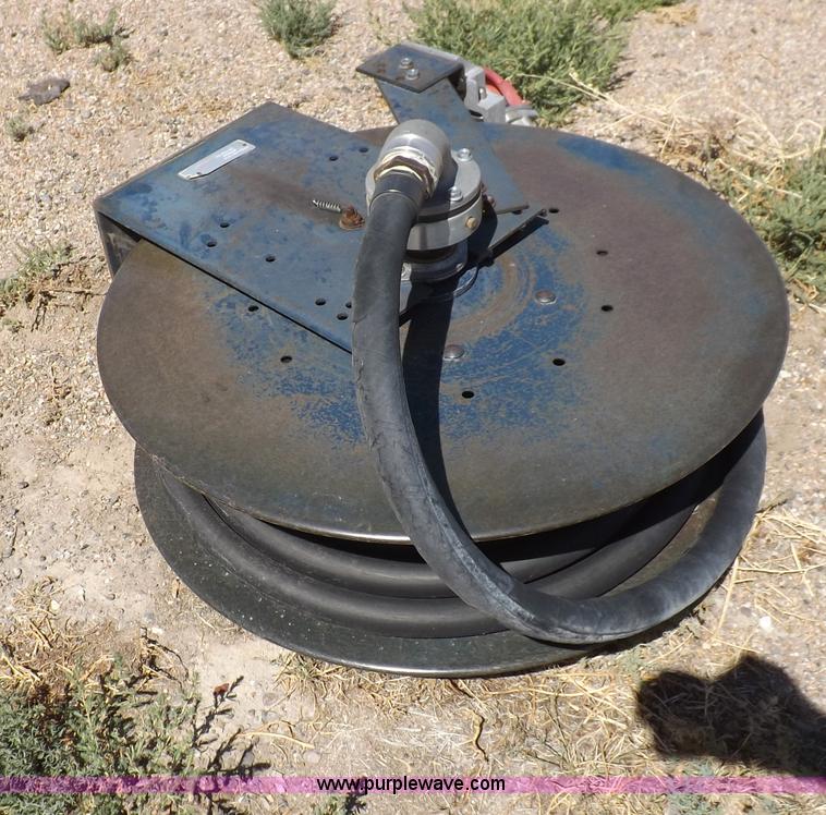 image for item F6020 Two fuel pumps and a hose reel