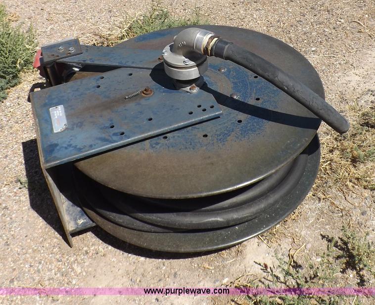 image for item F6020 Two fuel pumps and a hose reel