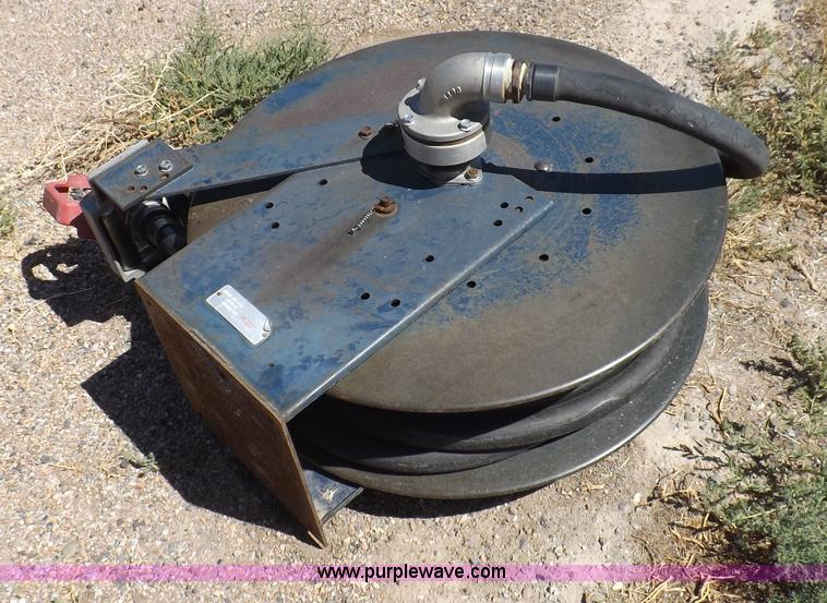 image for item F6020 Two fuel pumps and a hose reel