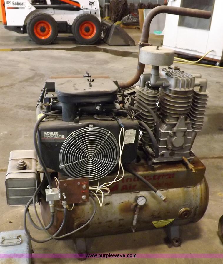 image for item J9042 Air compressor and hose reel