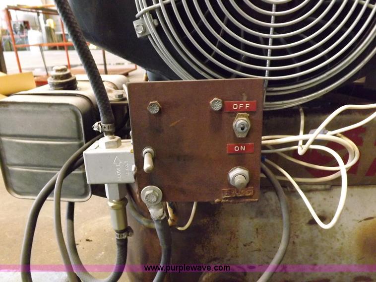 image for item J9042 Air compressor and hose reel