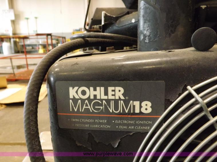 image for item J9042 Air compressor and hose reel