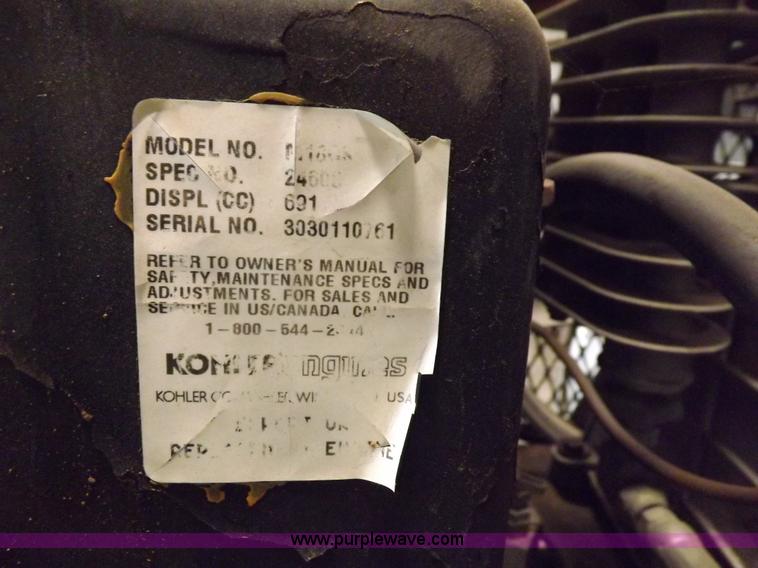 image for item J9042 Air compressor and hose reel