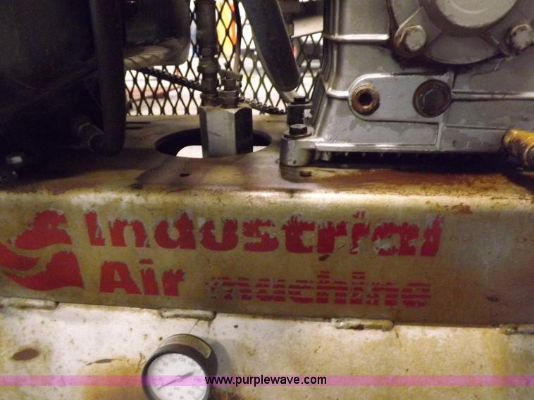 image for item J9042 Air compressor and hose reel