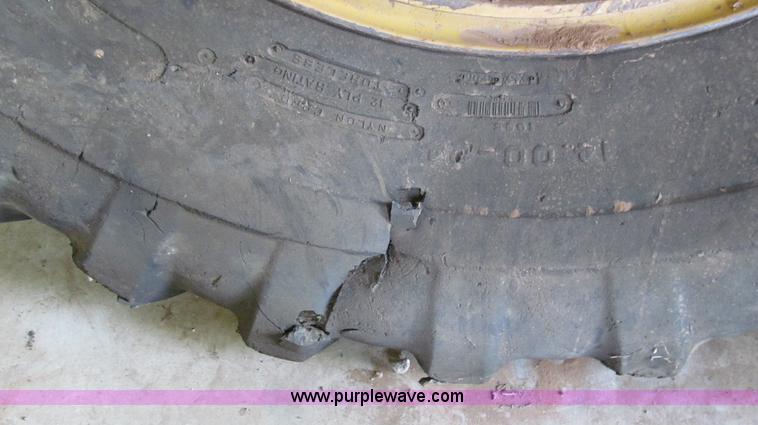 image for item C3533 14.00-24 tires and wheels