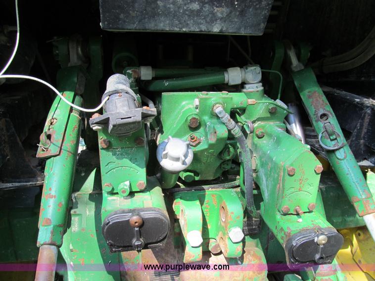 image for item E3504 1989 John Deere 4455 MFWD tractor