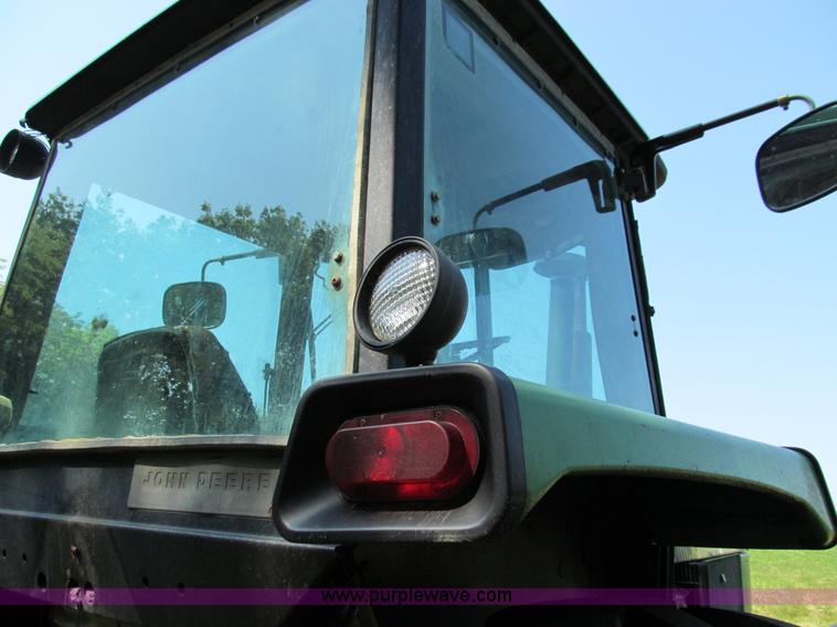 image for item E3504 1989 John Deere 4455 MFWD tractor