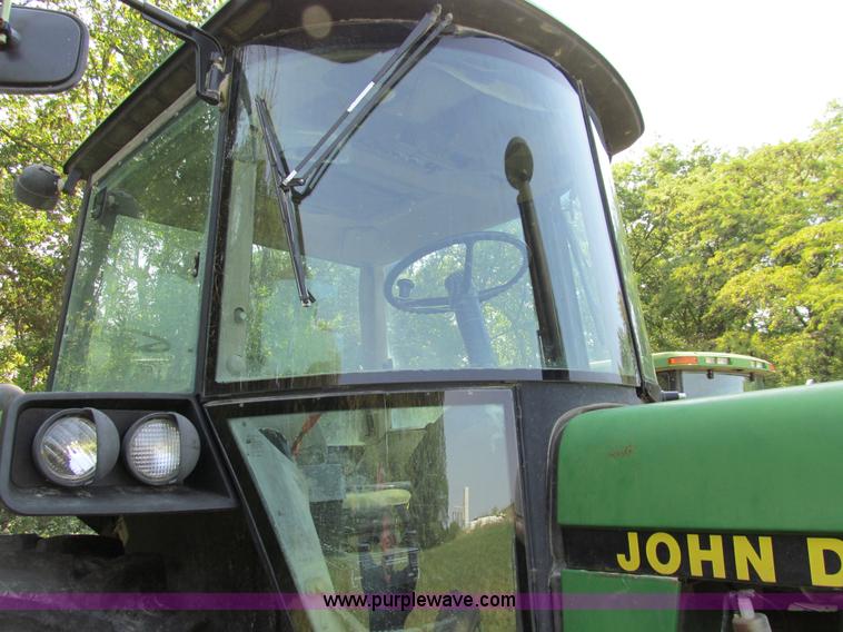 image for item E3504 1989 John Deere 4455 MFWD tractor