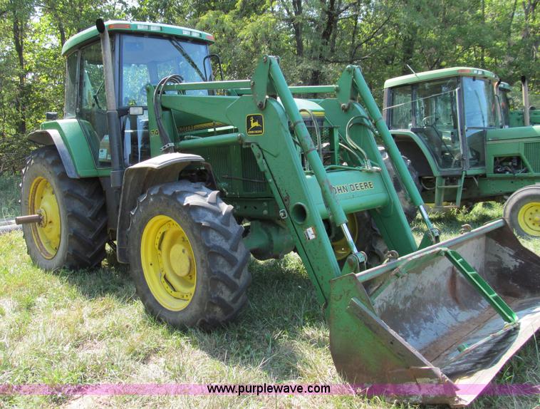 image for item E3505 1991 John Deere 7700 MFWD tractor