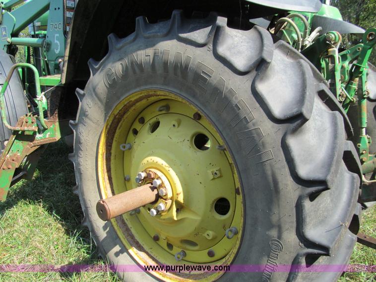 image for item E3505 1991 John Deere 7700 MFWD tractor