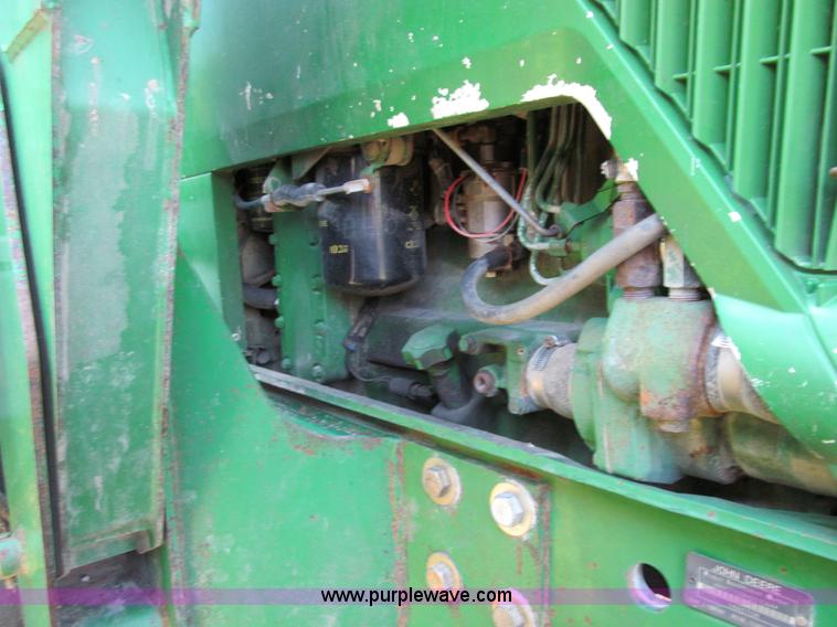 image for item E3505 1991 John Deere 7700 MFWD tractor
