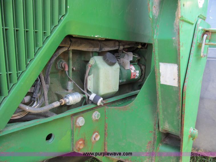 image for item E3505 1991 John Deere 7700 MFWD tractor
