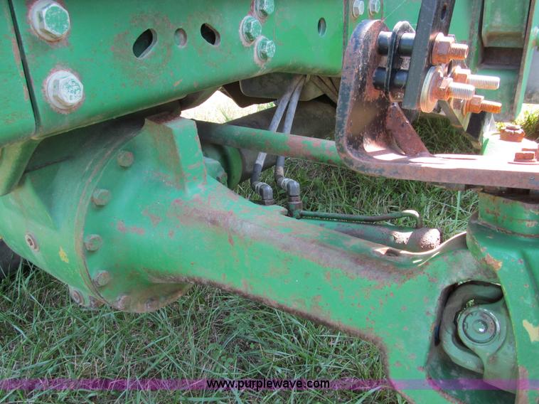 image for item E3505 1991 John Deere 7700 MFWD tractor