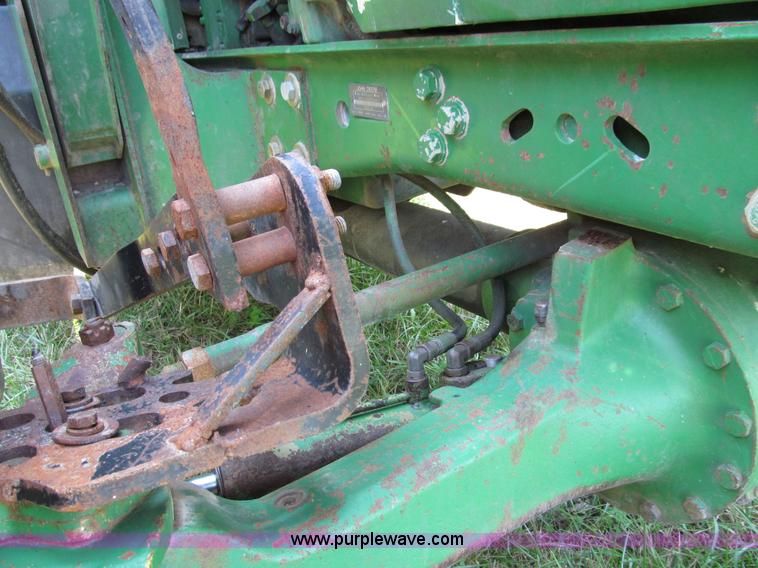 image for item E3505 1991 John Deere 7700 MFWD tractor