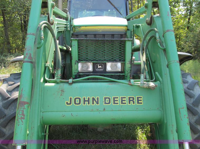 image for item E3505 1991 John Deere 7700 MFWD tractor