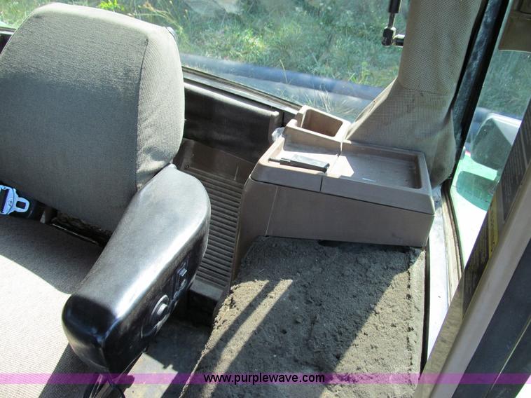 image for item E3505 1991 John Deere 7700 MFWD tractor