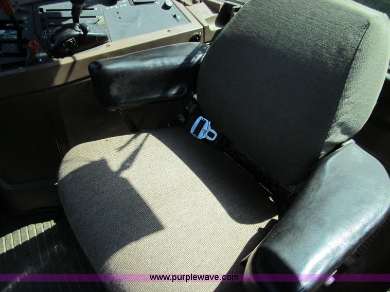 image for item E3505 1991 John Deere 7700 MFWD tractor