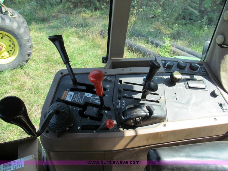 image for item E3505 1991 John Deere 7700 MFWD tractor