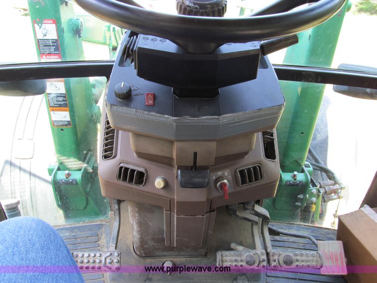 image for item E3505 1991 John Deere 7700 MFWD tractor