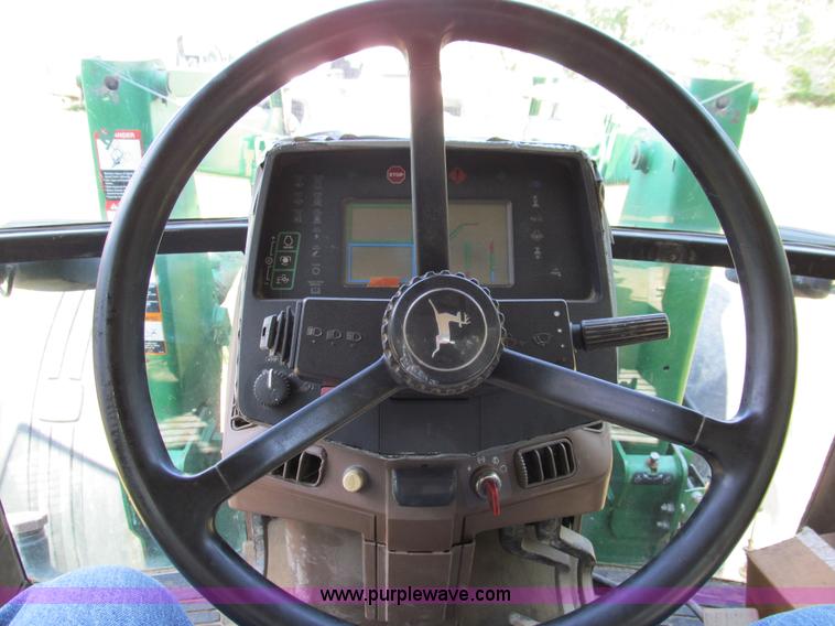 image for item E3505 1991 John Deere 7700 MFWD tractor