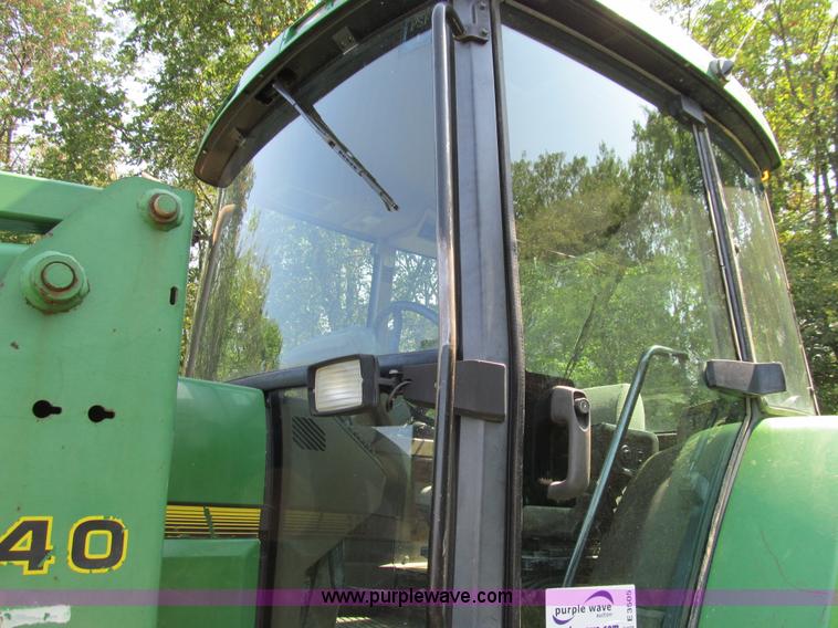 image for item E3505 1991 John Deere 7700 MFWD tractor