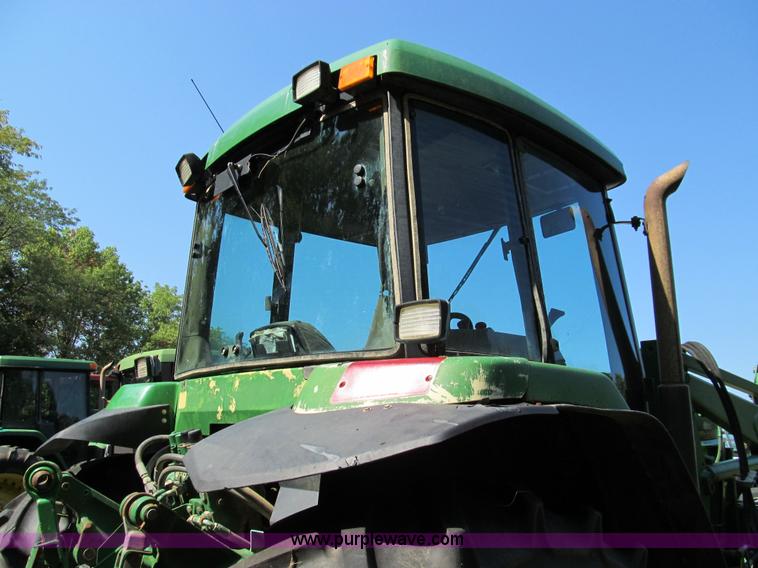 image for item E3505 1991 John Deere 7700 MFWD tractor