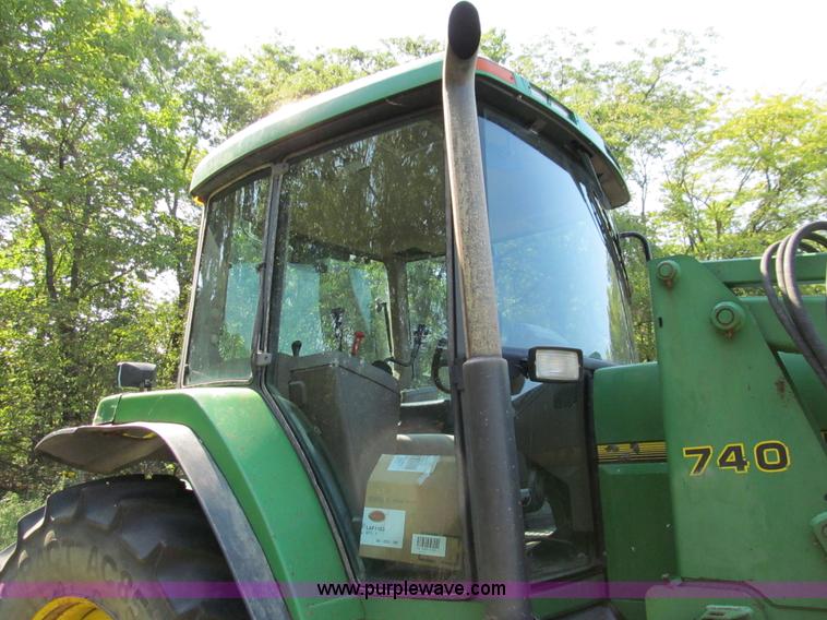 image for item E3505 1991 John Deere 7700 MFWD tractor