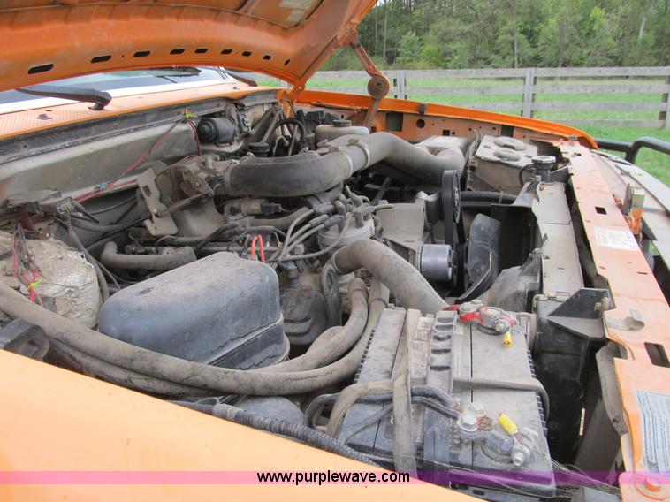 image for item B2881 1997 Ford F450 Super Duty flatbed pickup truck