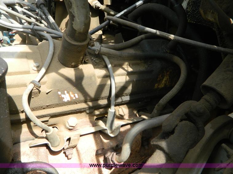 image for item B3894 1994 Ford F700 flatbed truck