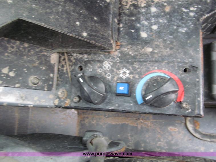 image for item E2172 2004 Takeuchi TL150 track skid steer