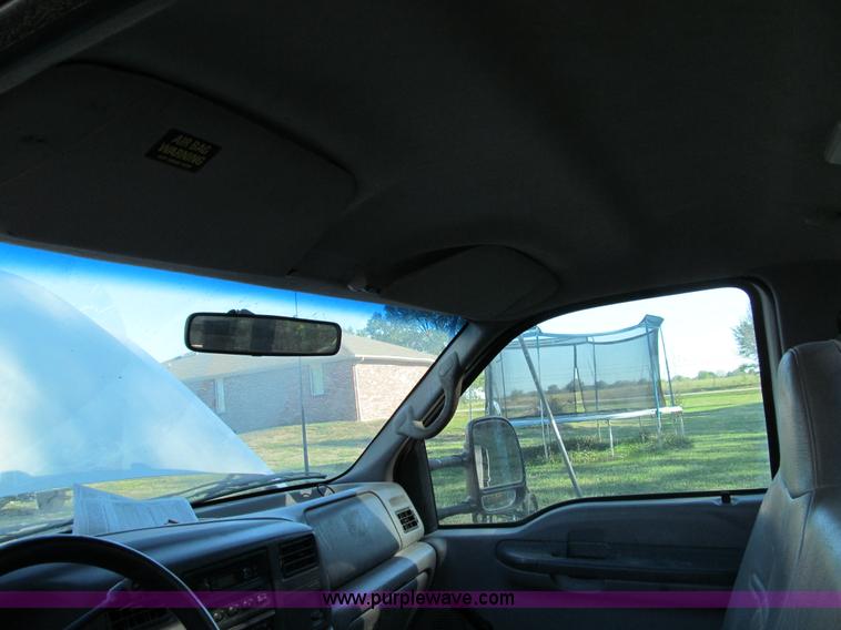 image for item E3509 1999 Ford F350 Super Duty flatbed pickup truck