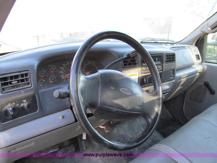 image for item E3509 1999 Ford F350 Super Duty flatbed pickup truck