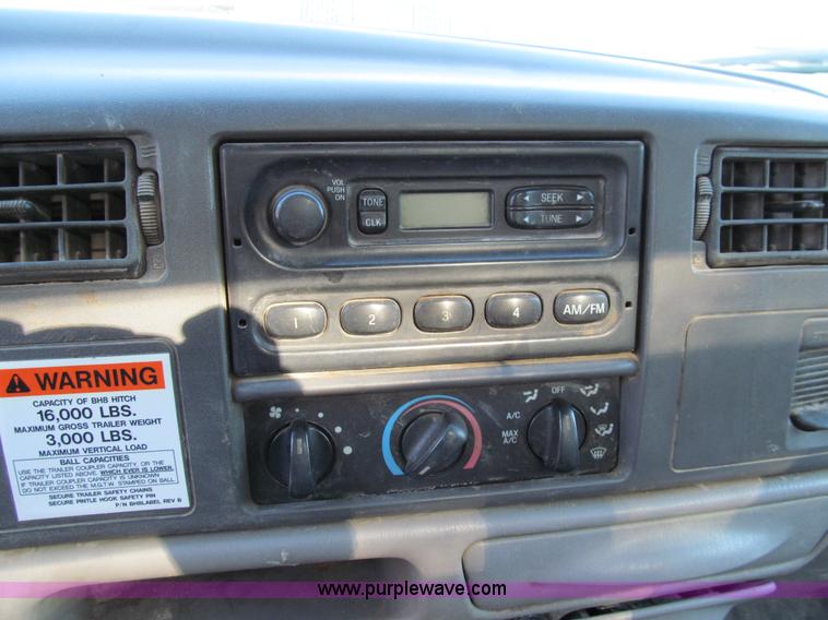 image for item E3509 1999 Ford F350 Super Duty flatbed pickup truck