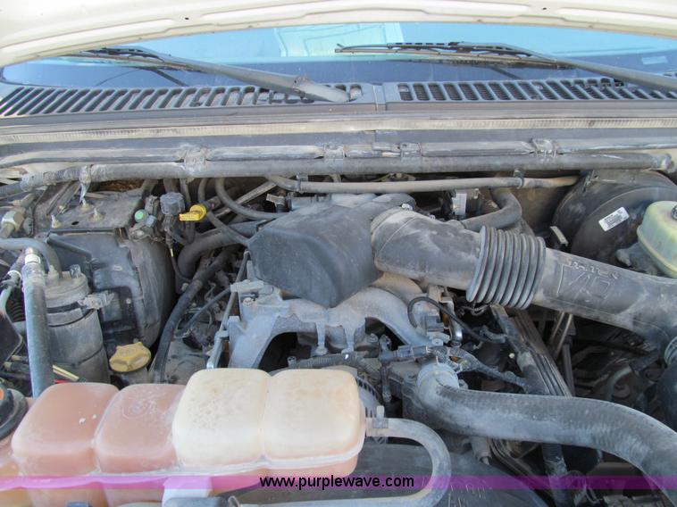 image for item E3509 1999 Ford F350 Super Duty flatbed pickup truck