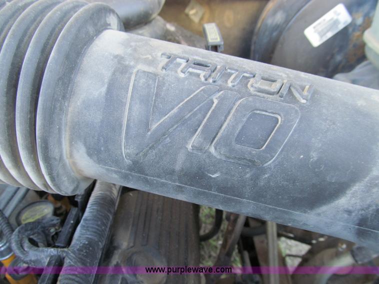 image for item E3509 1999 Ford F350 Super Duty flatbed pickup truck