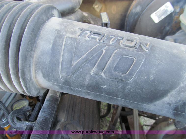 image for item E3509 1999 Ford F350 Super Duty flatbed pickup truck